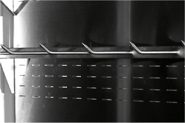 crossbars with "spitz" type hooks. in multideck refrigerated displays